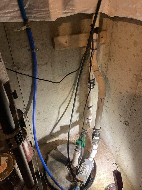 Successfully removed water backup system connected to the basement sump pump as requested. Inspected all associated plumbing components including PVC piping, connectors, and basin. No issues were identified with the existing sump pump setup in this 13-year-old home.
