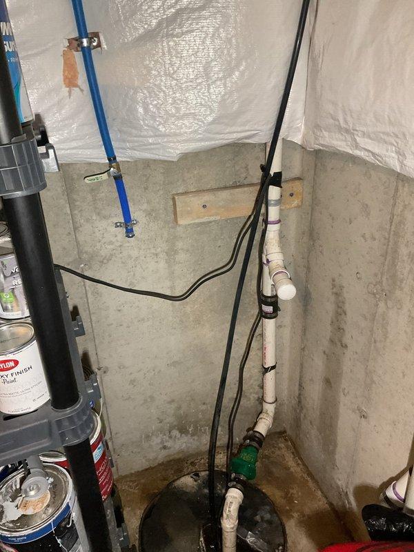 Successfully removed water backup system connected to the basement sump pump as requested. Inspected all associated plumbing components including PVC piping, connectors, and basin. No issues were identified with the existing sump pump setup in this 13-year-old home.