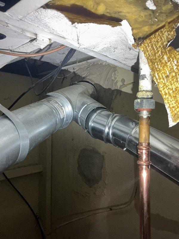 Successfully installed a new 40-gallon short natural gas water heater with proper safety components including drain pan, water alarm, and new gas valve. Upgraded plumbing with cold water riser featuring ball valve, humidifier stop, and hammer arrestor. Completed chimney liner replacement with new cap installation and reconfigured 5" dryer vent for improved ventilation. Replaced furnace filter (20x25x4) as part of comprehensive service.