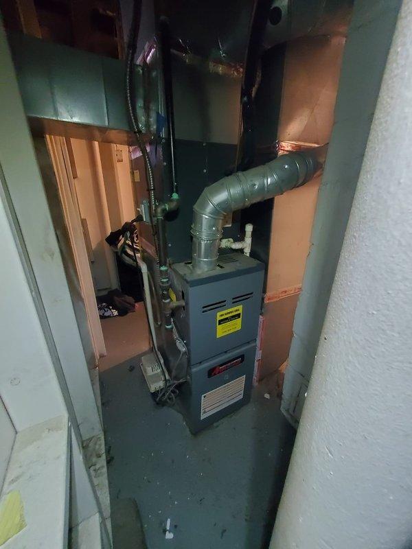 Responded to no heat complaint at rental property where system was blowing cold air. Performed diagnostic inspection of gas furnace and found unit operating properly with burners igniting correctly and normal flame pattern observed. Verified proper gas supply, electrical connections, and airflow through the system. No issues found during service call; system now heating effectively.