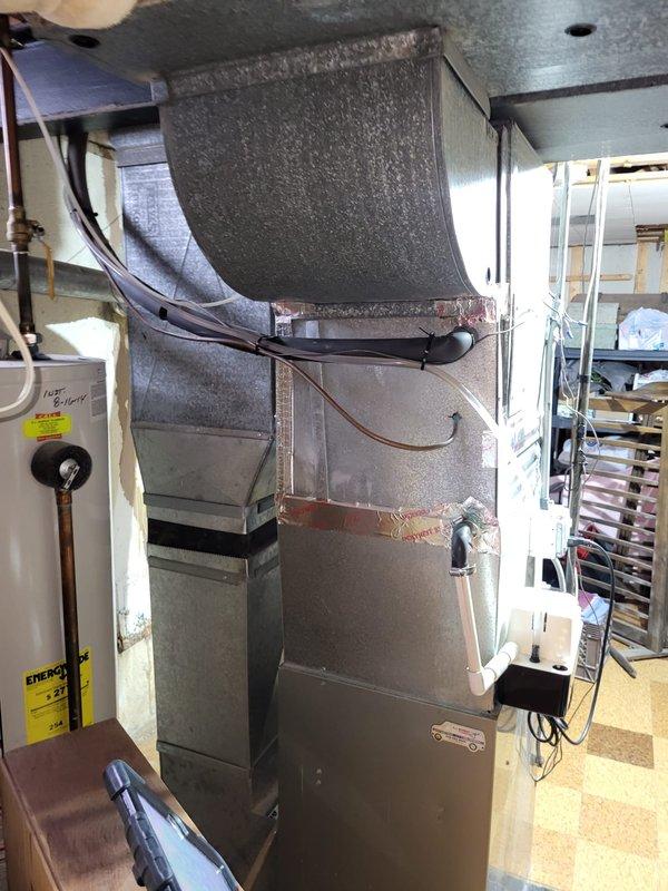 Inspected 15-year-old furnace system in basement that was heating inconsistently. Identified leaking inducer motor and multiple additional operational issues. Provided comprehensive replacement estimate for both furnace and AC systems to restore reliable heating and cooling functionality.