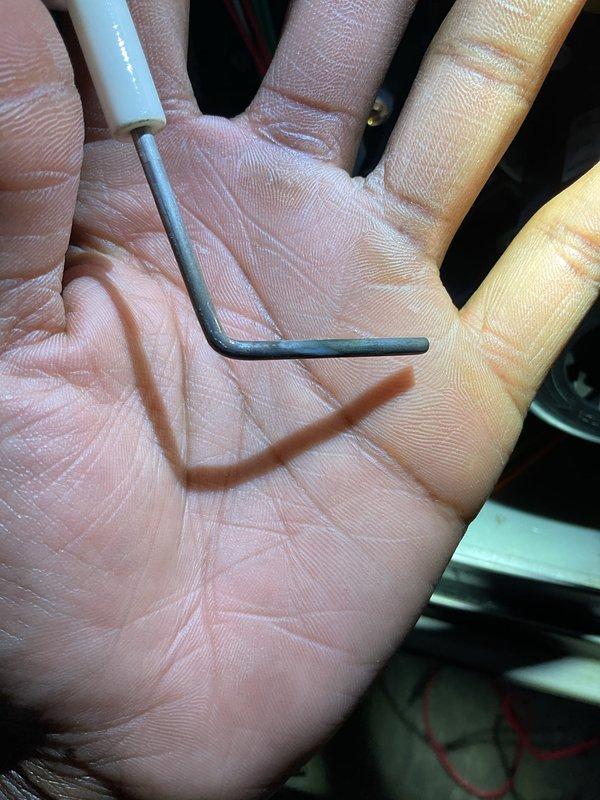 Completed Gold Furnace Inspection on 5-year-old forced air system located in basement. Inspected unit for proper operation, performed routine maintenance using hex tool to adjust components, and examined electrical connections including visible red and yellow wiring. System is functioning within normal parameters.