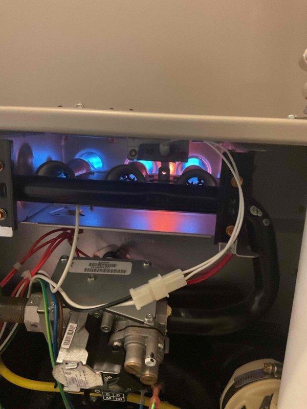 Completed Gold Furnace Inspection on 2018/2020 model furnace located in basement. Visual inspection of burner assembly confirmed proper flame pattern with consistent blue flames and normal operation. Examined blower motor, electrical connections, and ventilation components - all systems functioning within manufacturer specifications with no visible issues or maintenance concerns identified.