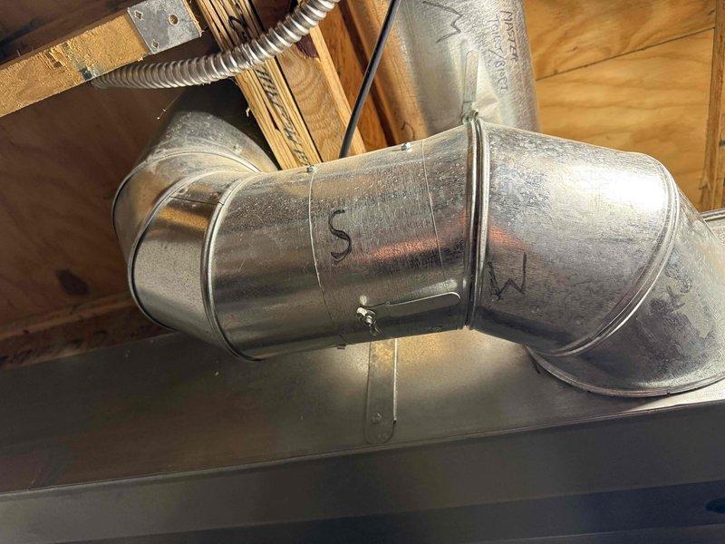 Performed diagnostic assessment of heating system experiencing uneven temperature distribution throughout the home. Inspected ductwork installation in attic/crawl space, identifying issues with the galvanized metal connections and airflow distribution. Evaluated hot water tank experiencing intermittent power loss during usage, which has been causing temperature fluctuations during showers for several months.