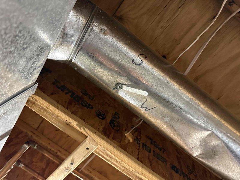 Performed diagnostic assessment of heating system experiencing uneven temperature distribution throughout the home. Inspected ductwork installation in attic/crawl space, identifying issues with the galvanized metal connections and airflow distribution. Evaluated hot water tank experiencing intermittent power loss during usage, which has been causing temperature fluctuations during showers for several months.