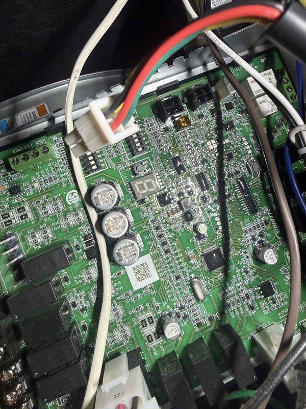 Responded to callback for thermostat malfunction and furnace noise concerns following recent furnace and A/C installation. Inspected control board circuitry and terminal connections, finding loose wiring at the terminal block. Secured all connections and verified proper operation of the system. Unit is now functioning normally with no unusual noise.