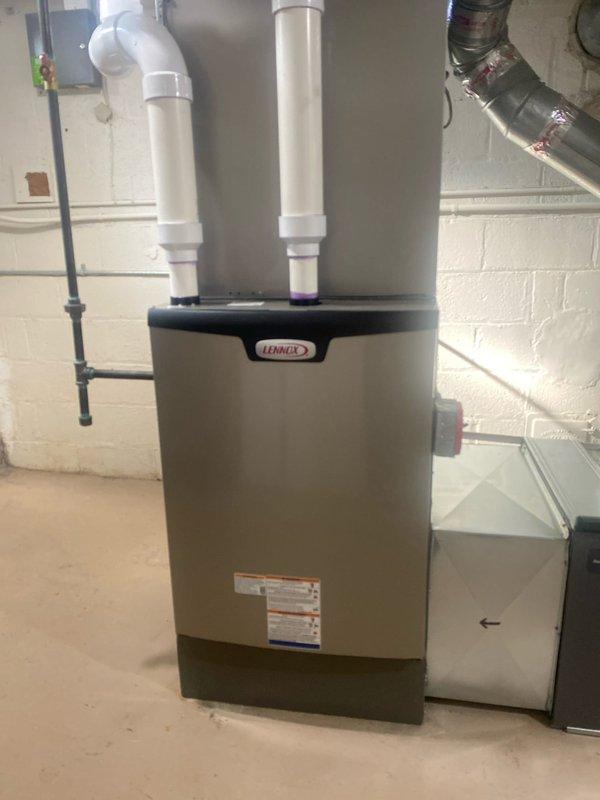 Completed installation of a Lennox furnace (135,000 BTU) with humidifier. System includes proper PVC venting, ductwork connections with foil tape at joints, and a Nest thermostat with common wire. Electrical work was performed with permit pulled for mechanical and electrical components. DTE rebate documentation was completed.