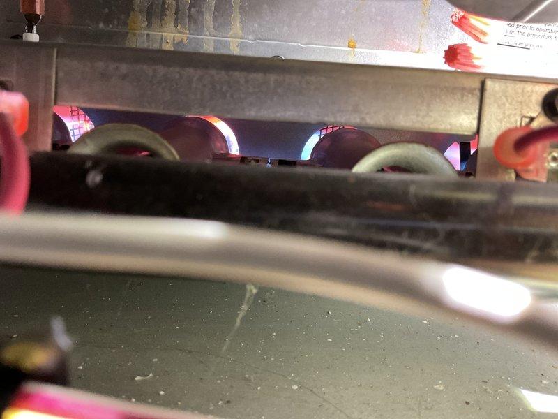 Responded to no-heat service call for intermittent heating issue. Diagnosed pilot light positioning problem affecting consistent ignition of burner assembly. Adjusted pilot light position to ensure proper flame impingement on thermocouple and verified complete ignition sequence across all burner tubes. System now heating properly with stable flame pattern and normal operation confirmed through multiple test cycles.