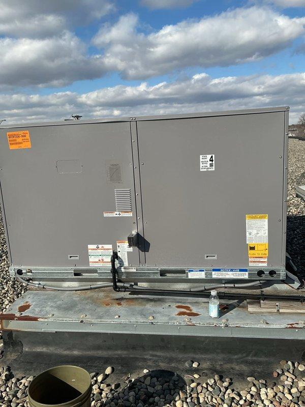 Successfully removed and replaced RTU #3 and #4 with new York units on commercial property, reusing existing smoke detection equipment while updating disconnects and GFI. Installation was completed using a 40-ton crane with Big Blue stats maintained for system performance.