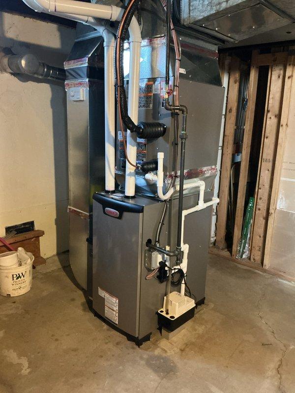 Successfully installed a new 70,000 BTU Lennox furnace system in basement location, including proper connection of all PVC ventilation pipes, copper lines, and drainage components. Completed installation of humidifier and performed all necessary electrical and mechanical reconnections according to code requirements, with permit properly requested for the installation.
