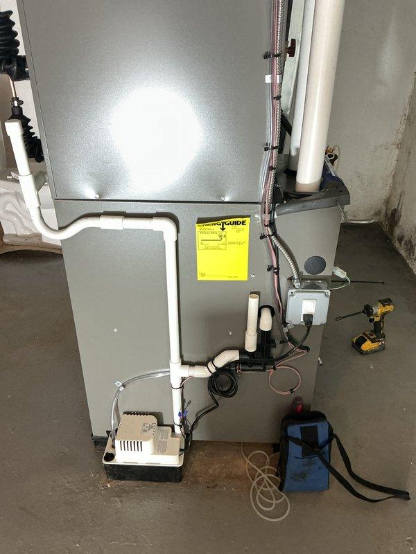 Completed installation of a complete HVAC system including a 70,000 BTU furnace, 2.5 ton AC unit, new thermostat, condensate pump, and duct liner. Installed new PVC venting with proper support to joists and completed all necessary electrical work including a new dedicated circuit, with all appropriate permits secured for mechanical and electrical components.