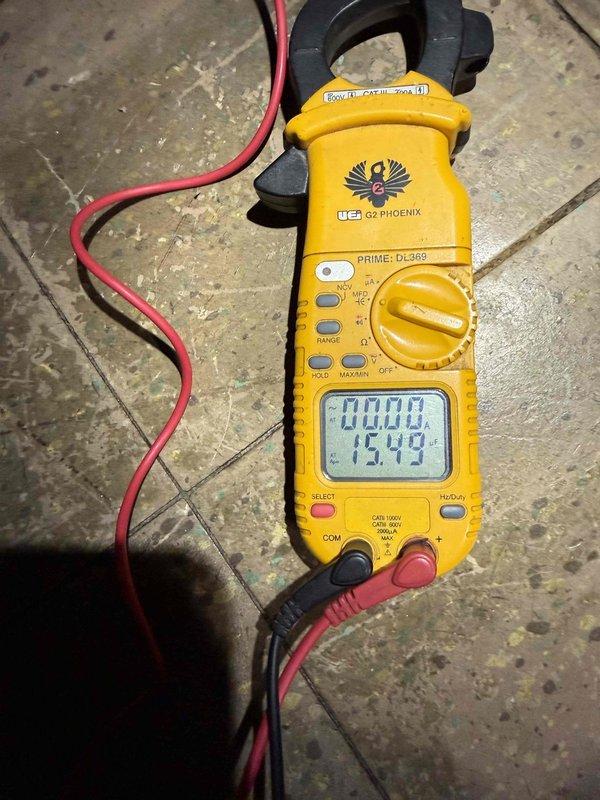 Performed diagnostic testing on furnace system that was failing to cycle off properly. Used UEi DL369 Phoenix clamp meter to measure electrical current values on blower motor and inducer motor components (readings of 004.1/0.146 and 0.000/15.49 observed). Identified and corrected control circuit issue causing continuous operation.