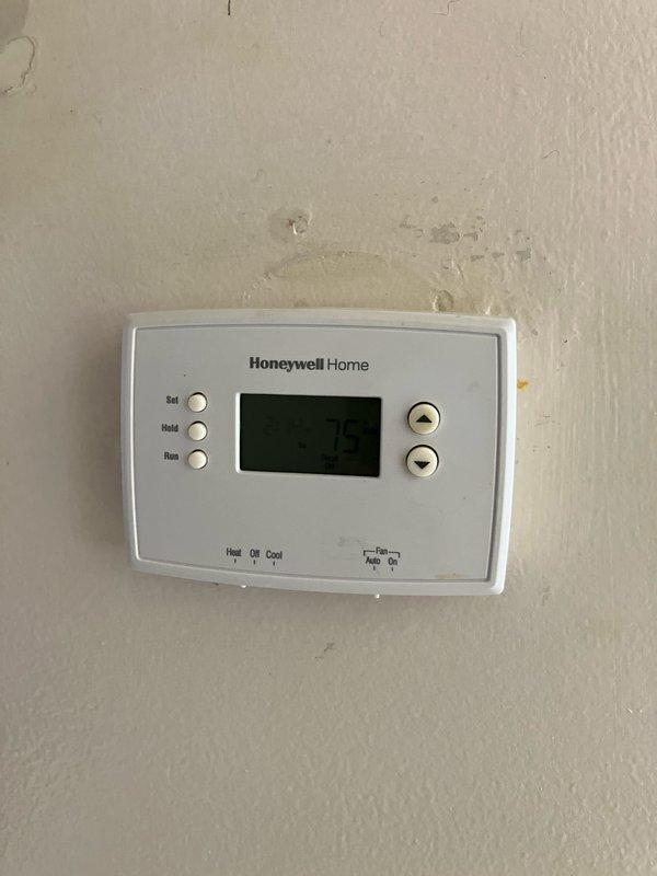 Performed diagnostic assessment on 15+ year-old furnace that failed to maintain operation long enough to heat the residence despite previous repair attempts by another company (inducer motor and gas valve replacement). Inspection revealed a failed blower motor that only activates upon furnace overheating, producing screeching noises and burning odor when operational. Recommended complete system replacement due to age and multiple component failures.