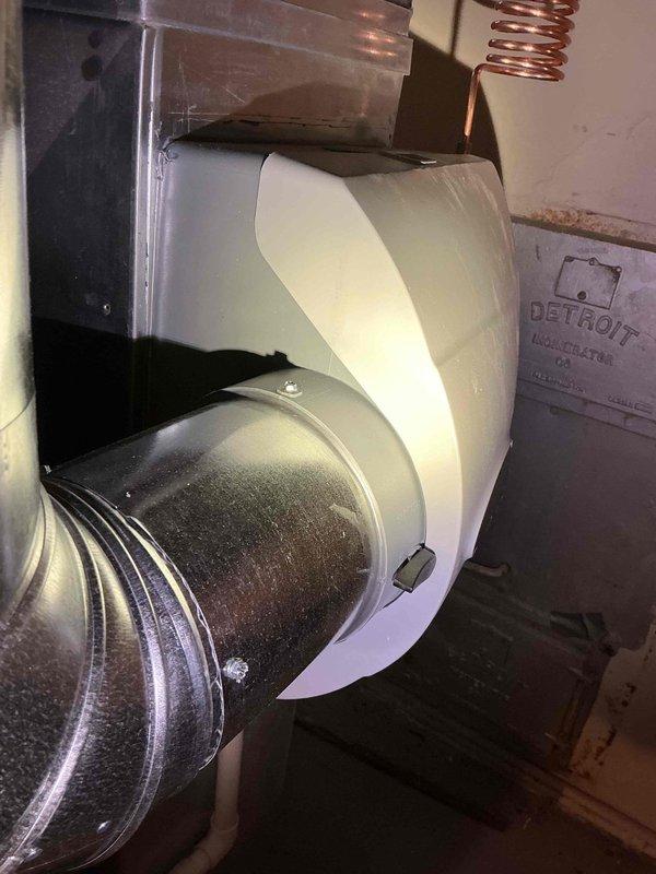 Completed installation of an Aprilaire humidifier with required connections, including 6" supply ductwork (3' total) and 10' of PVC drain line. System was properly mounted, with copper feed line installed and controller set up on the furnace housing for optimal humidity regulation.