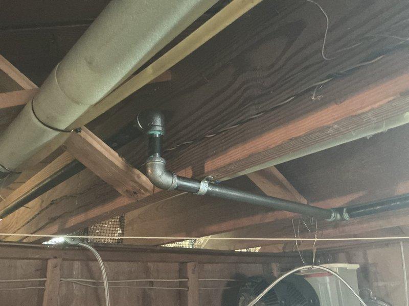 Installed new gas supply line for dryer. Located and connected to existing gas piping system in basement, routing through floor joists and terminating with appropriate shut-off valve at appliance location. Verified connections for proper sealing and tested system for leaks to ensure safe operation.