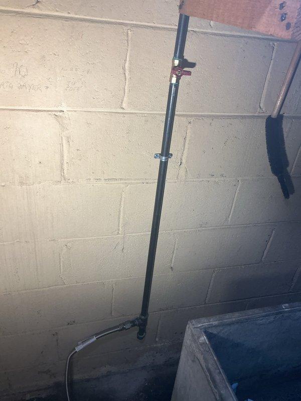 Installed new gas supply line for dryer. Located and connected to existing gas piping system in basement, routing through floor joists and terminating with appropriate shut-off valve at appliance location. Verified connections for proper sealing and tested system for leaks to ensure safe operation.