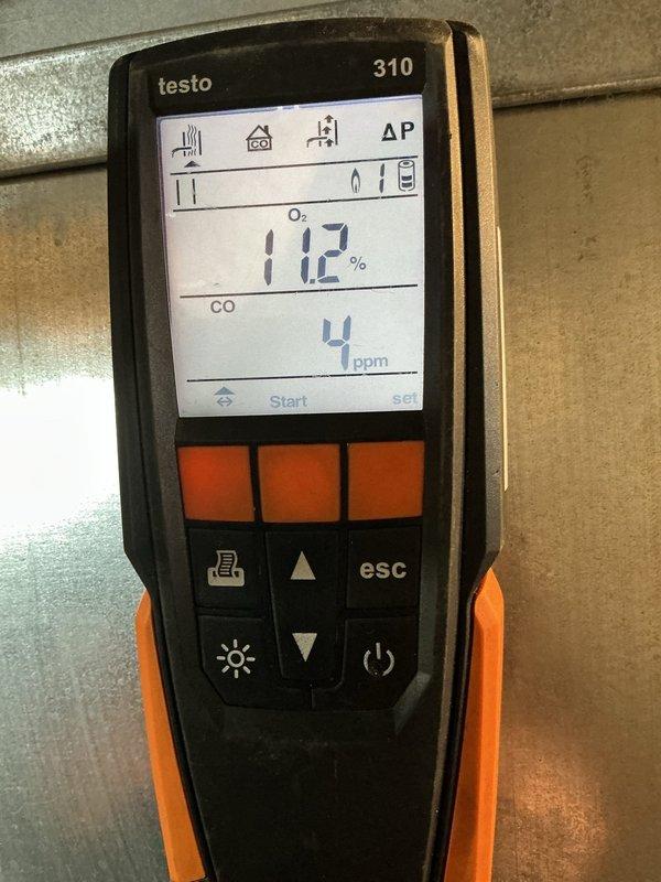 Responded to emergency furnace service call for 5-year-old unit. Inspected motor assembly showing signs of wear with visible wiring connections. Conducted combustion analysis with Testo 310, confirming O2 levels at 17.2% and CO at 4 ppm, indicating proper combustion parameters after service.