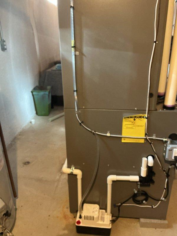 Responded to service call for newly installed furnace not operating. Diagnosed issue with improper condensate drainage system and corrected PVC pipe configuration. Verified proper operation of unit after repair and confirmed all connections were secure with no leaks present.
