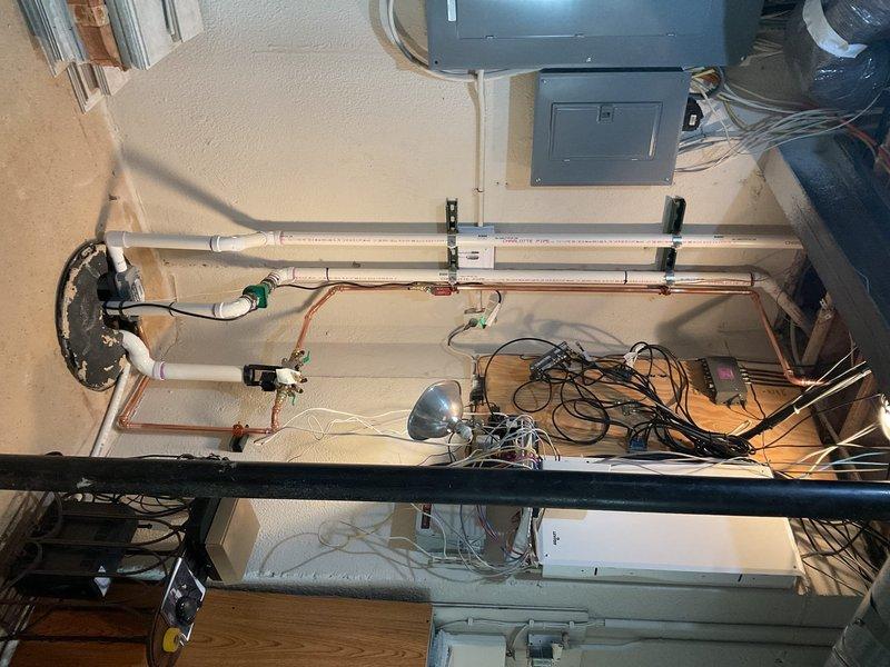 Performed inspection and service on primary/backup pump system. Verified proper operation of copper supply lines, PVC drainage components, and control valves. All connections were secure with no signs of leakage or corrosion; system functioning as designed.