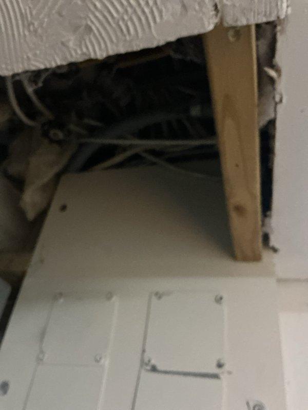 Responded to service call for non-functioning dishwasher outlet. Discovered electrical connection issue in the area under sink where disposal unit is installed. Repaired wiring connection and verified outlet functionality with voltage tester, ensuring proper power supply for upcoming dishwasher installation. Documented repair with photos for verification purposes and communicated successful resolution to client.