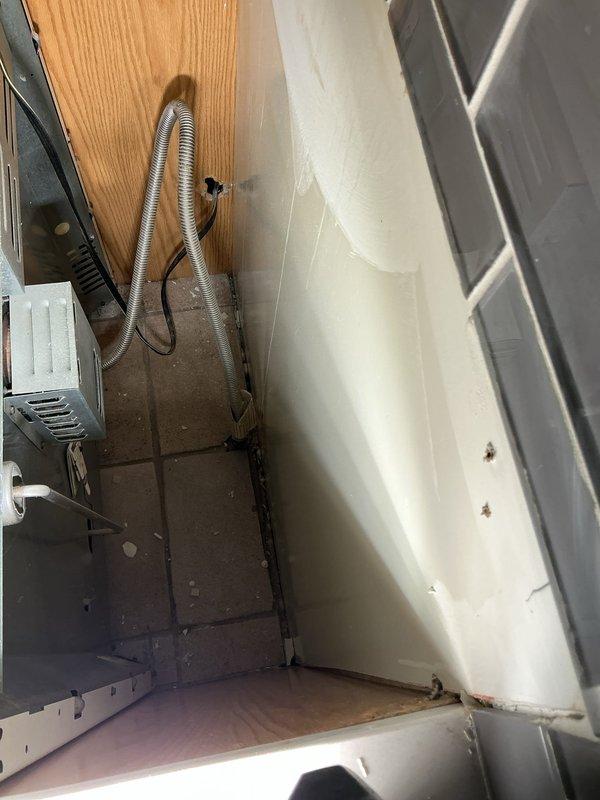 Completed installation of customer-supplied laundry tub faucet in basement, installed washer hookups with shut-off valve, and connected gas lines with shut-off valves for kitchen stove and basement dryer. All connections were tested for proper function and leaks to ensure safe operation of all fixtures.