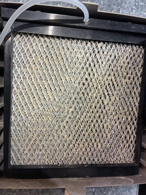 Responded to service call for Bryant Plus 90t furnace making rattling noise, which customer attributed to blower wheel issue. Upon inspection, found the 10-year-old system's air filter was significantly dirty and contributing to airflow restrictions. Replaced filter and lubricated blower motor bearings to eliminate rattling noise, allowing safe restoration of heat operation.