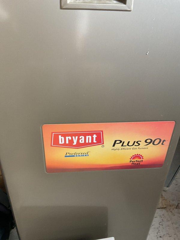 Responded to service call for Bryant Plus 90t furnace making rattling noise, which customer attributed to blower wheel issue. Upon inspection, found the 10-year-old system's air filter was significantly dirty and contributing to airflow restrictions. Replaced filter and lubricated blower motor bearings to eliminate rattling noise, allowing safe restoration of heat operation.