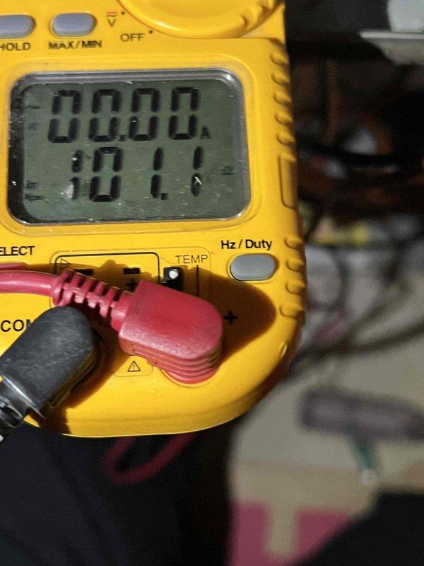 Responded to no heat call for a 13-year-old furnace located in basement. Performed diagnostic testing with multimeter, measuring electrical parameters at 10.11V. Inspected gas valve system, noting significant corrosion on connecting pipes near the RED TOP valve, which was affecting proper gas flow to the heating system. Cleaned connections and restored proper heat output to resolve the customer's complaint.