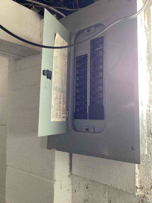 Conducted site assessment for potential mini-split installation in a home without existing AC. Evaluated electrical panel capacity and current HVAC infrastructure, noting functional natural gas furnace with standard ductwork that appears to be in good condition with proper installation markings. Provided customer with mini-split options suitable for the property configuration.