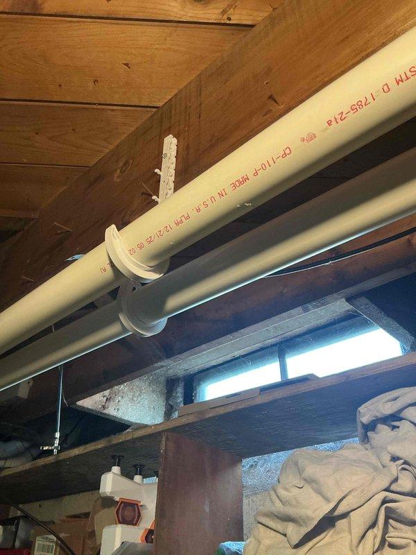 Completed installation of a 70,000 BTU furnace with mechanical and electrical connections. System was properly vented with PVC piping secured to ceiling joists, and exterior drainage was configured with appropriate P-trap assembly. Michigan Saves financing was secured and consumer rebate documentation was processed.