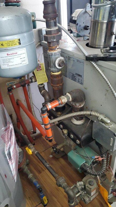 Responded to callback for home still experiencing insufficient heat despite recent repair. Upon inspection of the boiler system, observed corrosion on copper piping and examined the expansion tank functionality. Adjusted system parameters and verified proper operation, confirming adequate heat output before departure.