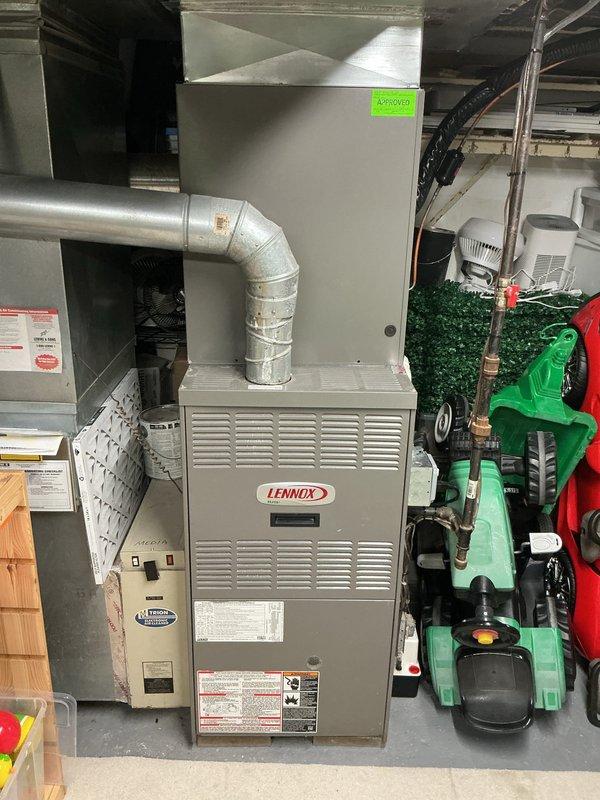 Performed diagnostic assessment on 10+ year old Lennox furnace located in basement. Unit has failing inducer motor; previous control board replacement was noted. Customer was informed of replacement options as an alternative to continued repairs on aging system.