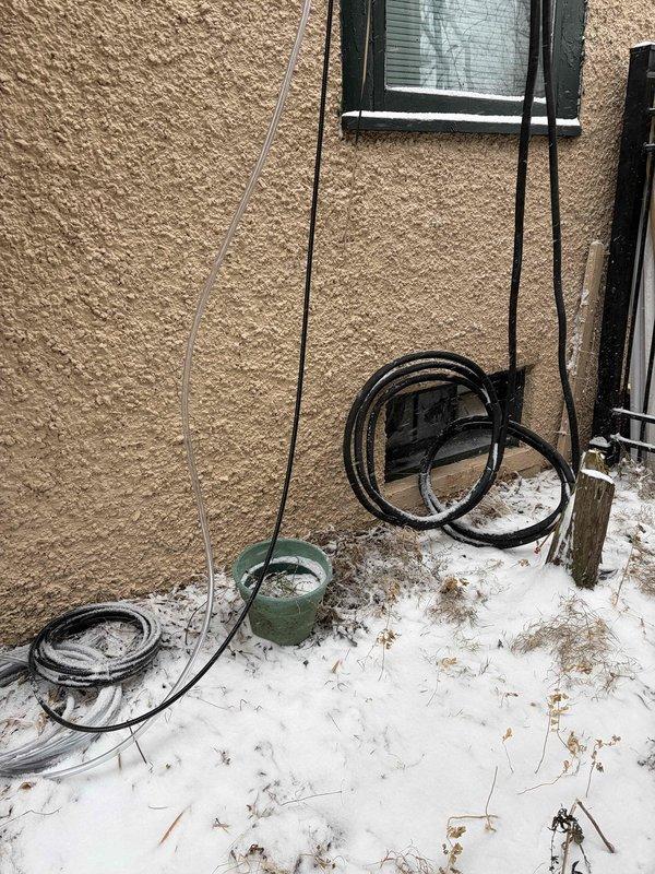 Successfully completed mini-split installation with new circuit, including proper wall penetration sealed with expanding foam and exterior line management. System installed with condensate pump and linehide, with all electrical connections properly secured according to mechanical and electrical permit requirements.