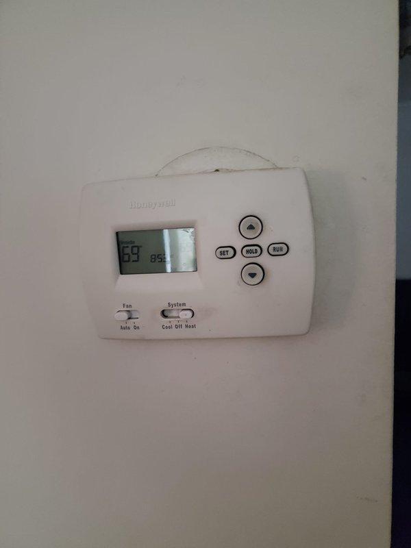 Responded to service call for unusual noise from 15+ year old furnace located in basement. Upon inspection, found the unit to be in relatively good condition with no visible damage or deterioration to the ducting or main components. Checked Honeywell thermostat which was functioning properly, displaying correct temperature and humidity readings. Performed standard diagnostic procedures, identified and eliminated source of noise.