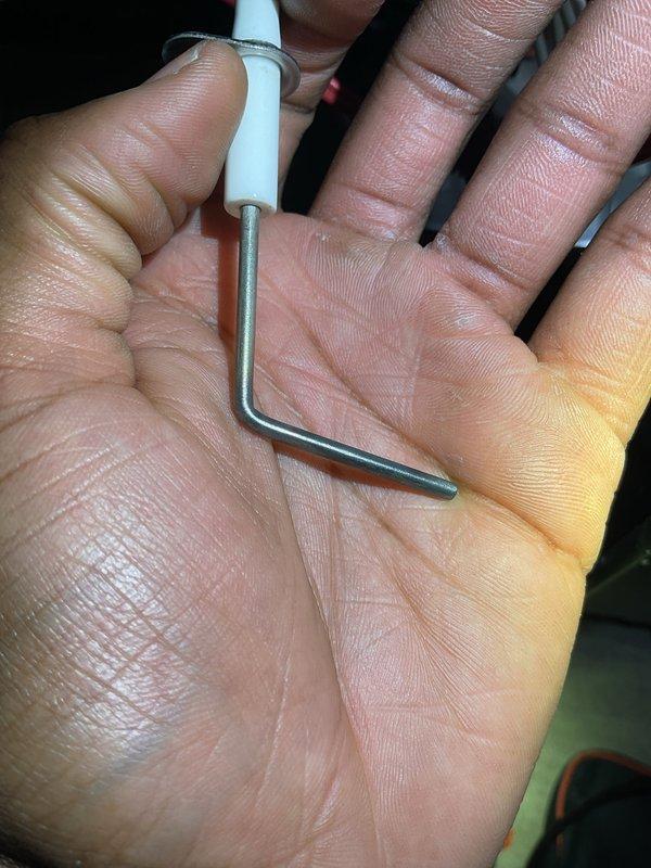 Performed Gold Furnace Inspection on a 10+ year old forced air system located in the basement. Conducted a comprehensive examination of the unit, including checking the intercom system mounted on the exterior brick wall. Used specialized L-shaped tool for accessing and testing internal components. Customer was present during inspection.