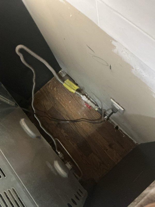Completed residential service call to replace flexible gas line for stove. Successfully removed old corrugated metal line and installed new flexible gas connector between yellow gas valve and appliance. Ensured proper connection and tested system for leaks to verify safe operation.