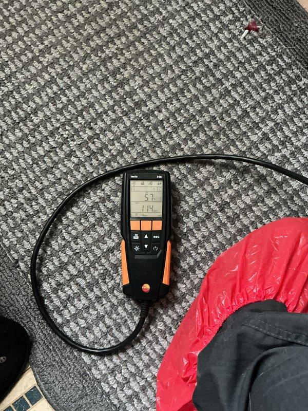 Responded to service call for intermittently functioning forced air furnace (approximately 8+ years old). Conducted comprehensive diagnostic testing using Fieldpiece pressure measurement device and Testo 310 combustion analyzer to verify system operation parameters. Readings indicated pressure values of 0.049/-0.036 and combustion efficiency values of 5.7/1.14, resolving the intermittent operation issue through appropriate adjustments to restore reliable heating function.