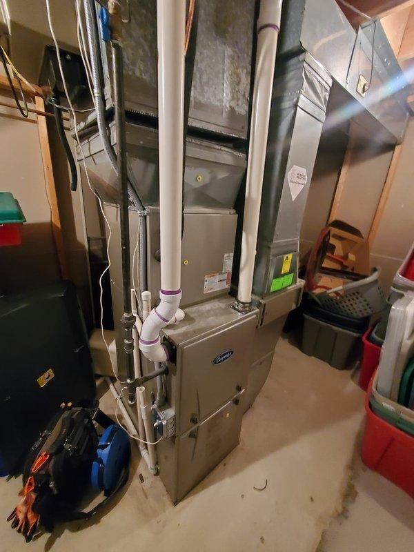 Responded to no-heat call for Carrier furnace that was cycling on briefly then shutting down. Diagnosed faulty flame sensor causing improper flame detection. Cleaned flame sensor contacts and tested system through multiple heating cycles to verify proper operation. System now maintaining consistent heat with normal operation restored.