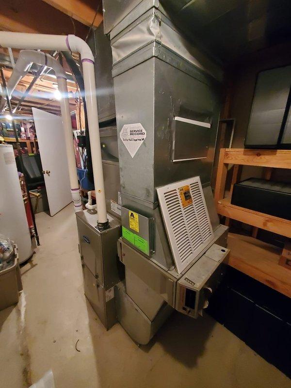 Responded to no-heat call for Carrier furnace that was cycling on briefly then shutting down. Diagnosed faulty flame sensor causing improper flame detection. Cleaned flame sensor contacts and tested system through multiple heating cycles to verify proper operation. System now maintaining consistent heat with normal operation restored.