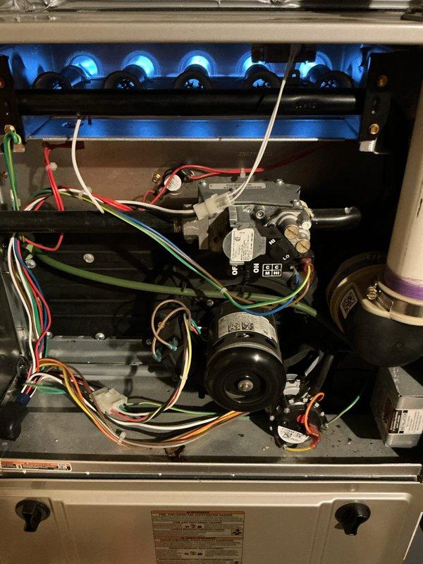 Performed Gold Furnace Inspection on 3-year-old basement furnace. Verified unit is operational with proper flame pattern and combustion. Inspected filter assembly, burner components, and blower motor - all functioning correctly with no issues identified.