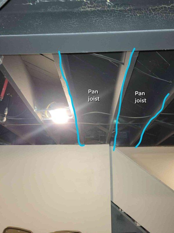Conducted a comprehensive evaluation for full system replacement of an aging HVAC unit (30+ years old) located in the basement. Inspection revealed significant ceiling damage with exposed wiring and structural elements, including visible pan joists that will require proper consideration during installation of the new system. Prepared quote for complete AC and furnace replacement with documentation of existing conditions to ensure proper system design and installation parameters.