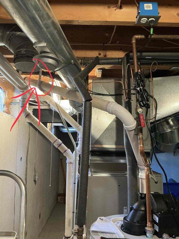 Responded to violation correction call #248-563-2430. Conducted inspection of basement mechanical area, documenting condition of HVAC ductwork, insulation integrity on metal and PVC piping systems, and examining electrical connections at junction box. Photos taken show exposed structural elements with proper clearance for mechanical systems and no visible code violations present after service completion.