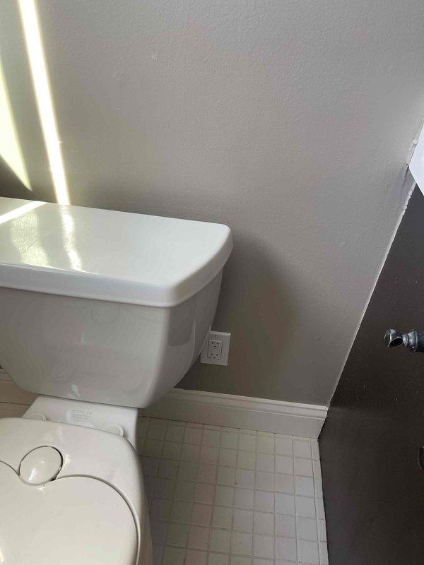 Installed a dedicated electrical outlet adjacent to toilet for bidet operation. Work involved cutting access into drywall, running appropriate electrical wiring through wall cavity, mounting new outlet box, and completing installation with proper cover plate. Verified proper voltage and functionality before completing service.