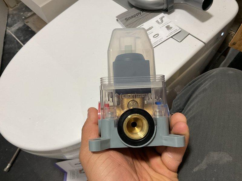 Conducted comprehensive assessment of shower plumbing system, identifying need for complete piping replacement. Accessed internal plumbing through wall cut-out, evaluated existing PVC and copper pipe condition, and installed new shower fixture with brass valve component. Work included removal of damaged sections and installation of upgraded piping system to ensure proper water flow and prevent future leaks.