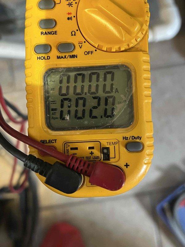 Responded to no-heat service call for 10+ year old furnace located in laundry room. Performed complete diagnostic testing using digital multimeter and Bacharach gas analyzer, which revealed CO levels at 58 ppm and excess air at 36.4%. Resolved issue causing unit to blow cold air and verified proper combustion parameters with stack temperature at 96.2°F.