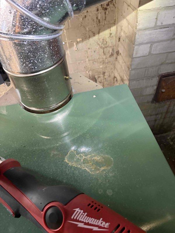 Responded to warranty service call for a new boiler installation that was completed 2 months prior. Identified and repaired a leak at a bushing connection located above the boiler where water droplets/condensation were visible on the metallic elbow joint. Inspected surrounding copper piping system and control valves to ensure proper operation after repair.