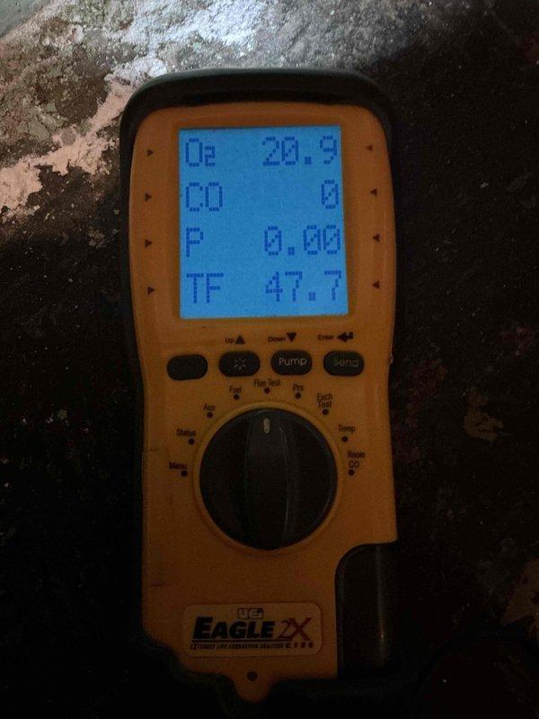 Completed Gold Boiler Inspection on a 10+ year old hot water boiler located in basement. Performed combustion analysis using Eagle 2X analyzer with readings showing proper oxygen levels (20.9%), zero carbon monoxide, and appropriate temperature readings. Visual inspection of burners confirmed proper flame pattern and color, indicating efficient operation. All systems functioning correctly with no issues identified.
