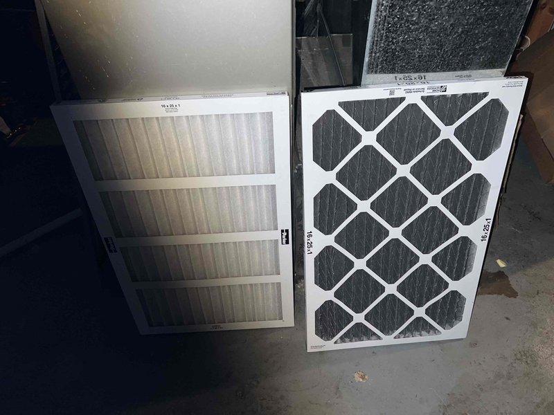 Responded to no-heat call for a duplex unit. Diagnosed and serviced 10+ year old furnace located in basement, finding significant dust accumulation in blower assembly causing restricted airflow. Replaced severely clogged air filters (16x25x1) with new filters, cleaned blower wheel, and verified proper system operation. Heat was successfully restored to the east side of the duplex.
