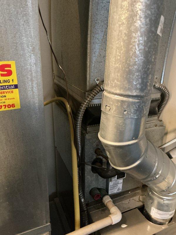 Performed comprehensive inspection of failed 15-year-old furnace, documenting multiple critical issues including cracked heat exchanger, seized inducer motor, oil-leaking blower motor, and accumulated debris on electrical components. Evaluated associated 2004 air conditioning system. Prepared detailed replacement estimate for complete furnace and AC system upgrade based on assessment findings.