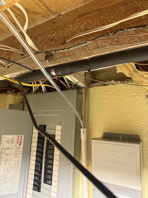 Replaced blackened condensate drain tube on 2-year-old furnace in basement. Unit is under both parts and labor warranty. Verified proper drainage and system operation after installation.